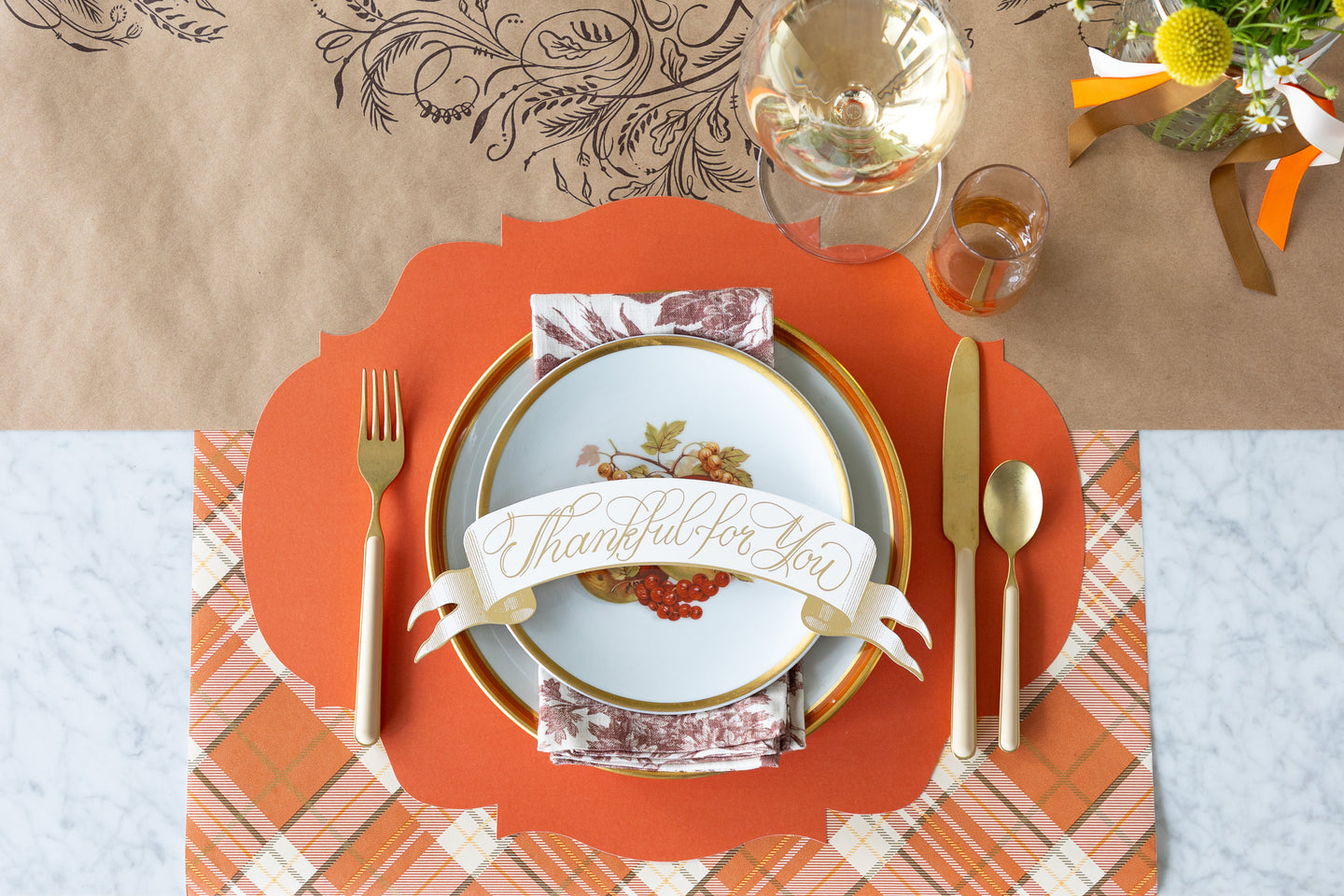 A fall table setting featuring the Die-cut Wood Slice Placemat with dinnerware and Fern Table Accent atop, on the Moss Green Classic Stripe Runner.