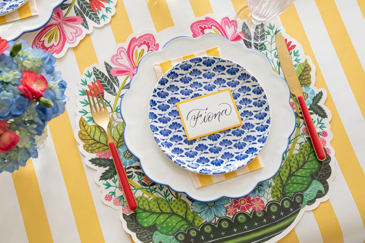 Vibrant Vases Story products styled on a brightly colored place setting.
