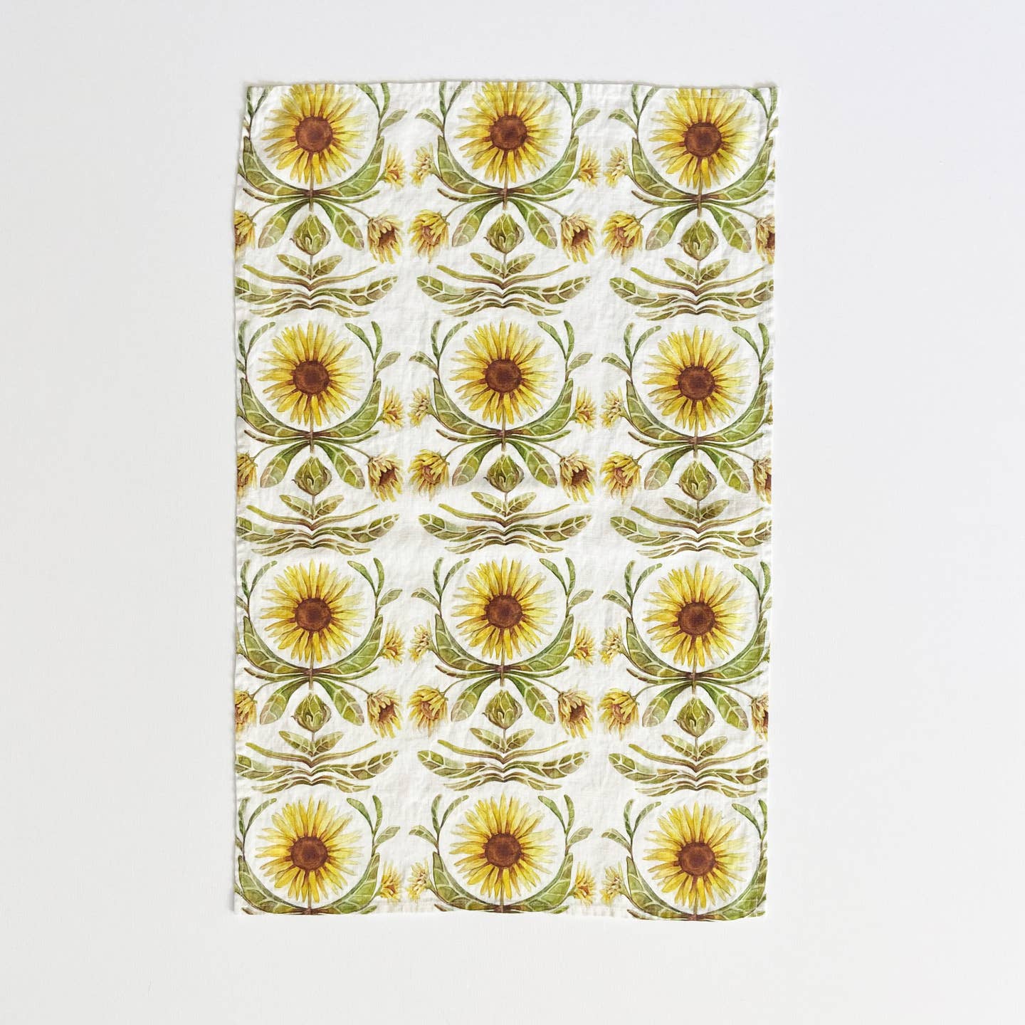 Patterned fabric with sunflower design on a white background