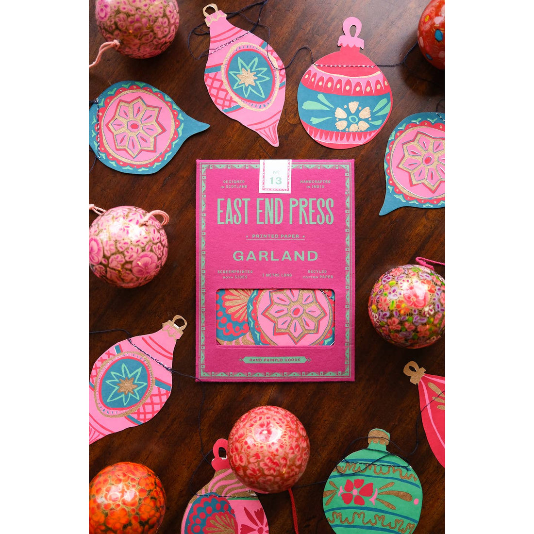 Decorative Christmas ornaments garland with packaging labeled &