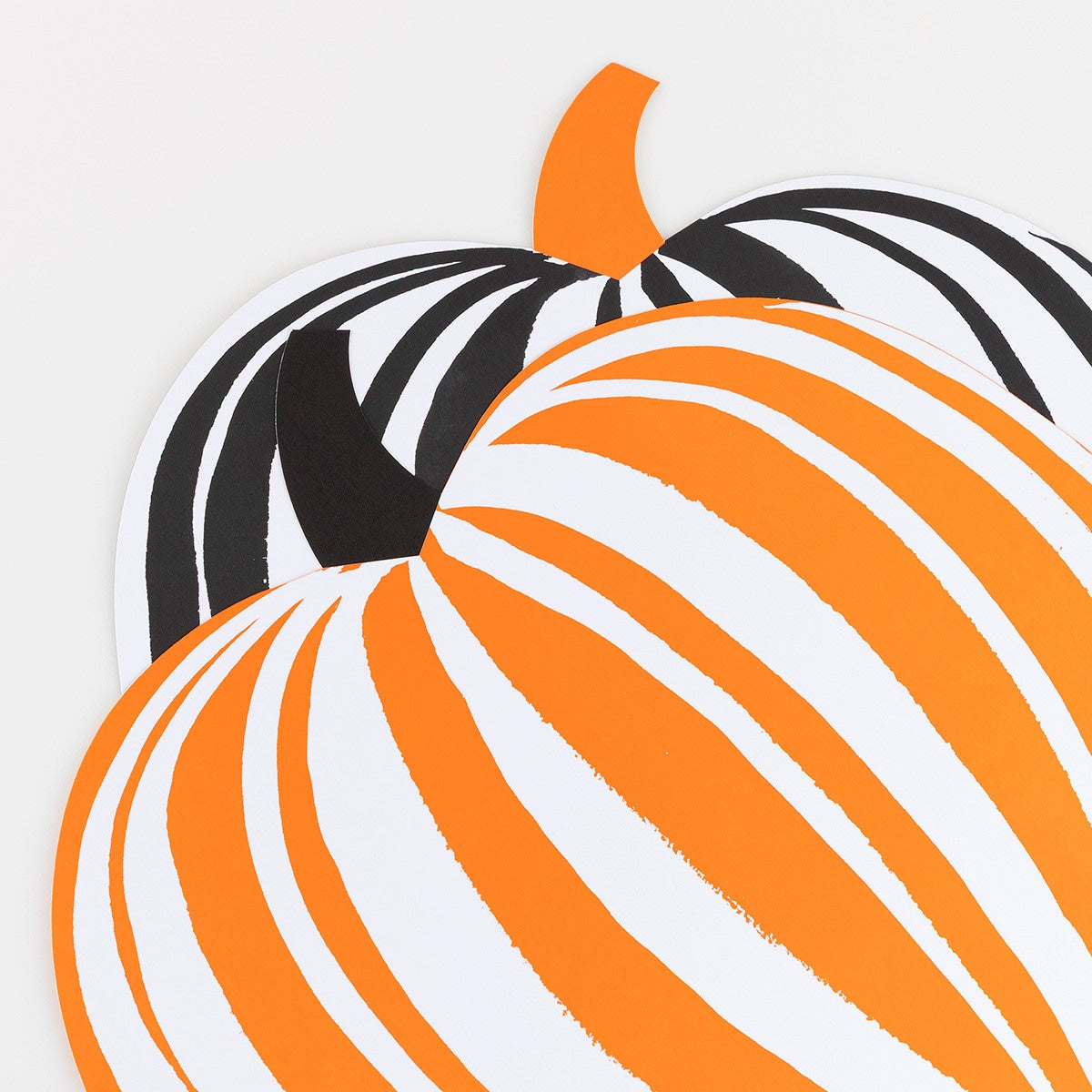 Two pumpkin designs, one orange with white stripes and one black and white striped, on a light gray background.