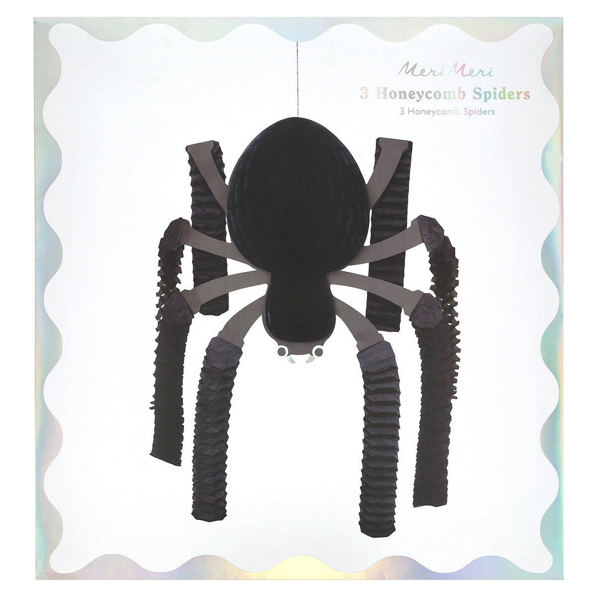 Black honeycomb spider toy on a white card with &