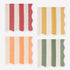 Four striped paper napkins in red, yellow, orange, and green on a white background. 