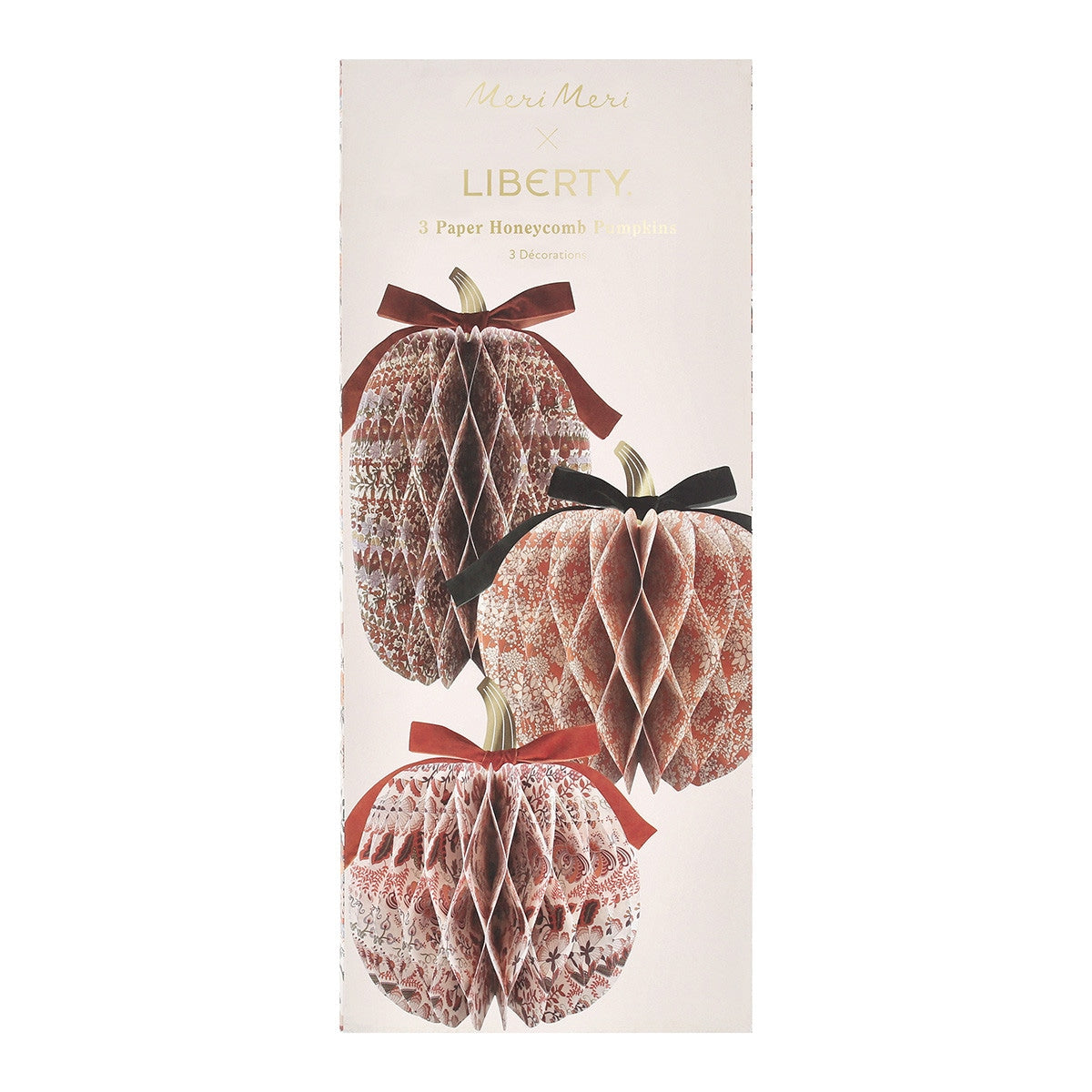 Packaging of Liberty paper honeycomb balls with decorative ribbons on a white background