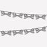 Decorative string with black and white stripe bows hung on it on a white background.