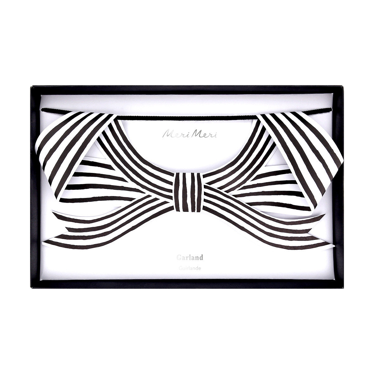 Black and white striped bow in a box with &