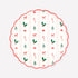 Decorative paper plate with Christmas-themed pattern on a white background.
