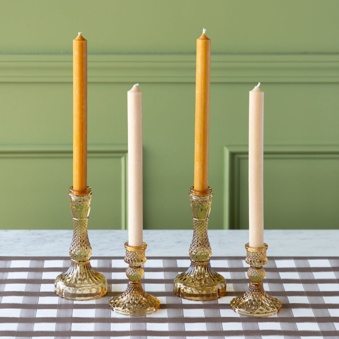 Vintage Amber Candlesticks with amber and cream taper candles on the Brown Painted Check Runner.