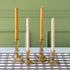 Vintage Amber Candlesticks with amber and cream taper candles on the Brown Painted Check Runner.
