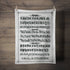 Tea towel with the alphabet written out on it in Old English style lettering and font. 