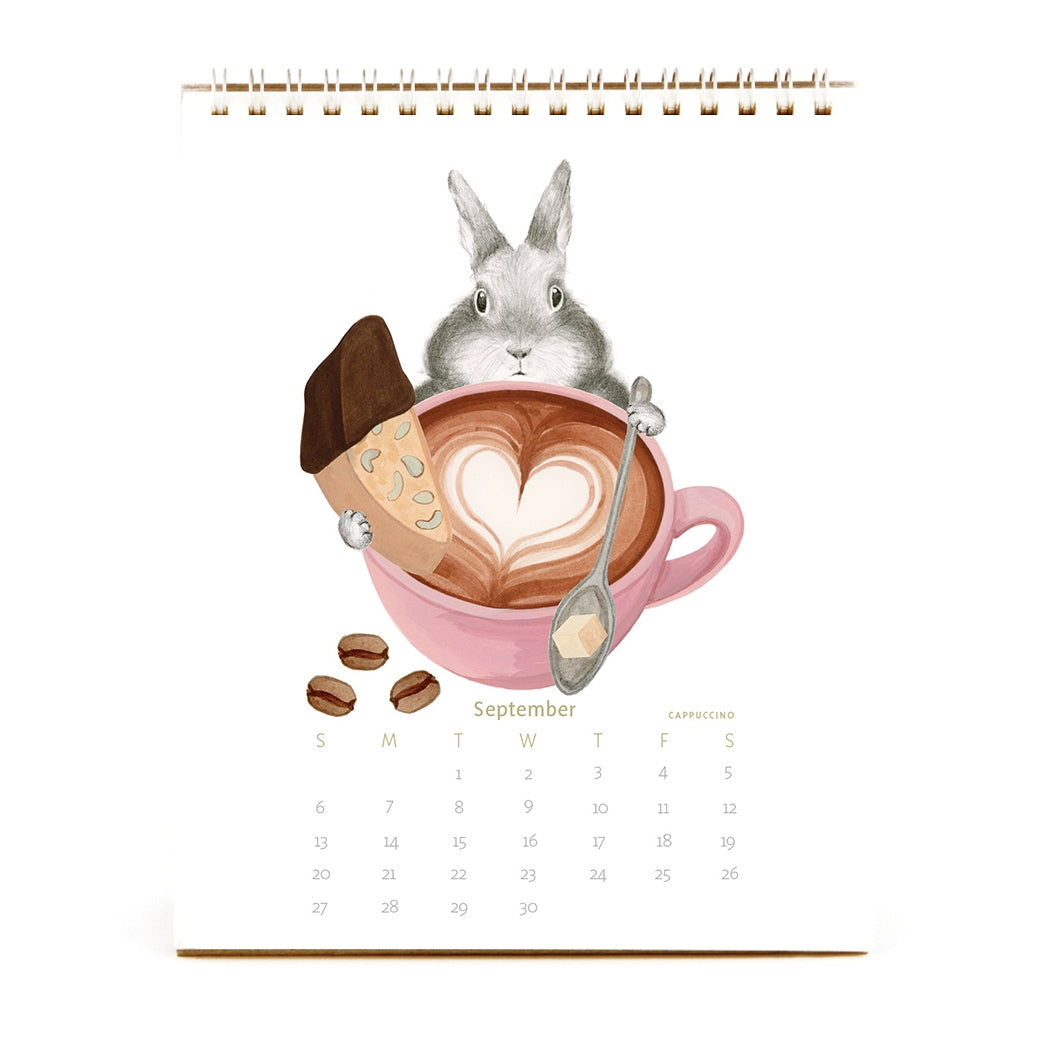 2026 Dear Hancock Bunny Calendar featuring a bunny behind a cup of coffee with a heart swirl in it.