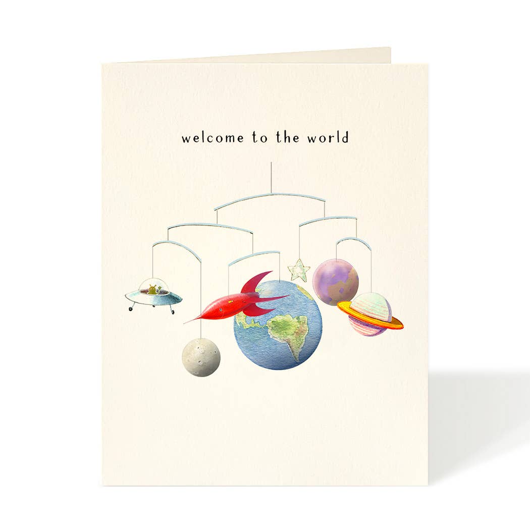 Greeting card with artwork depicting a baby mobile with a world a different planets a rocket ship and a space ship. Printed above is "welcome to the world".