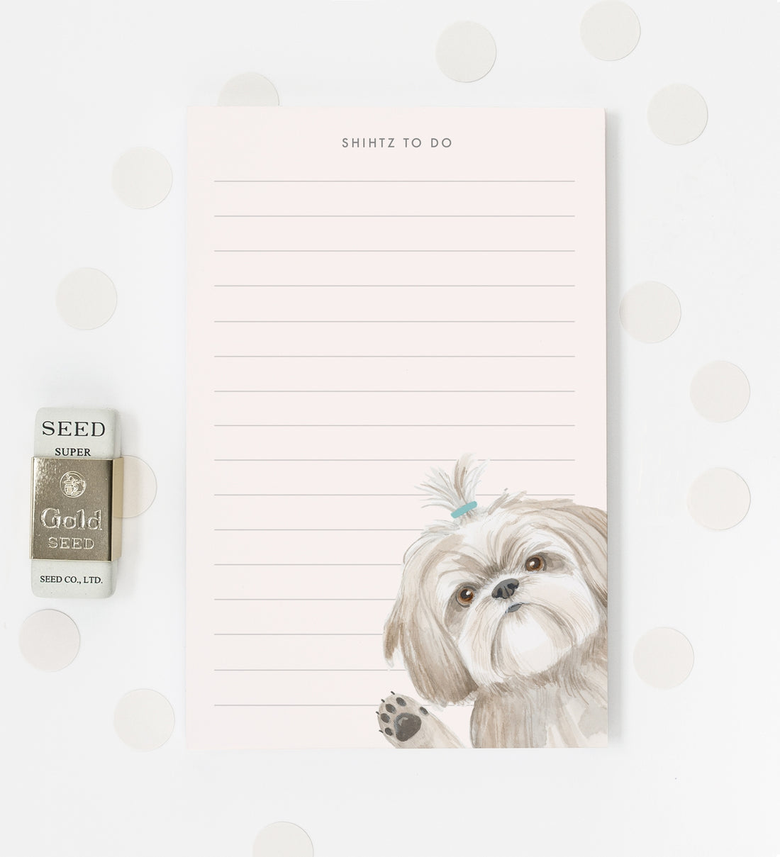 A lined notepad with an illustration of a shih tzu dog in the corner waving.  At the top of the notepad is printed "Shihtz to do".