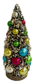 A small decorative silver glitter Christmas tree with multicolored glass balls ornaments.