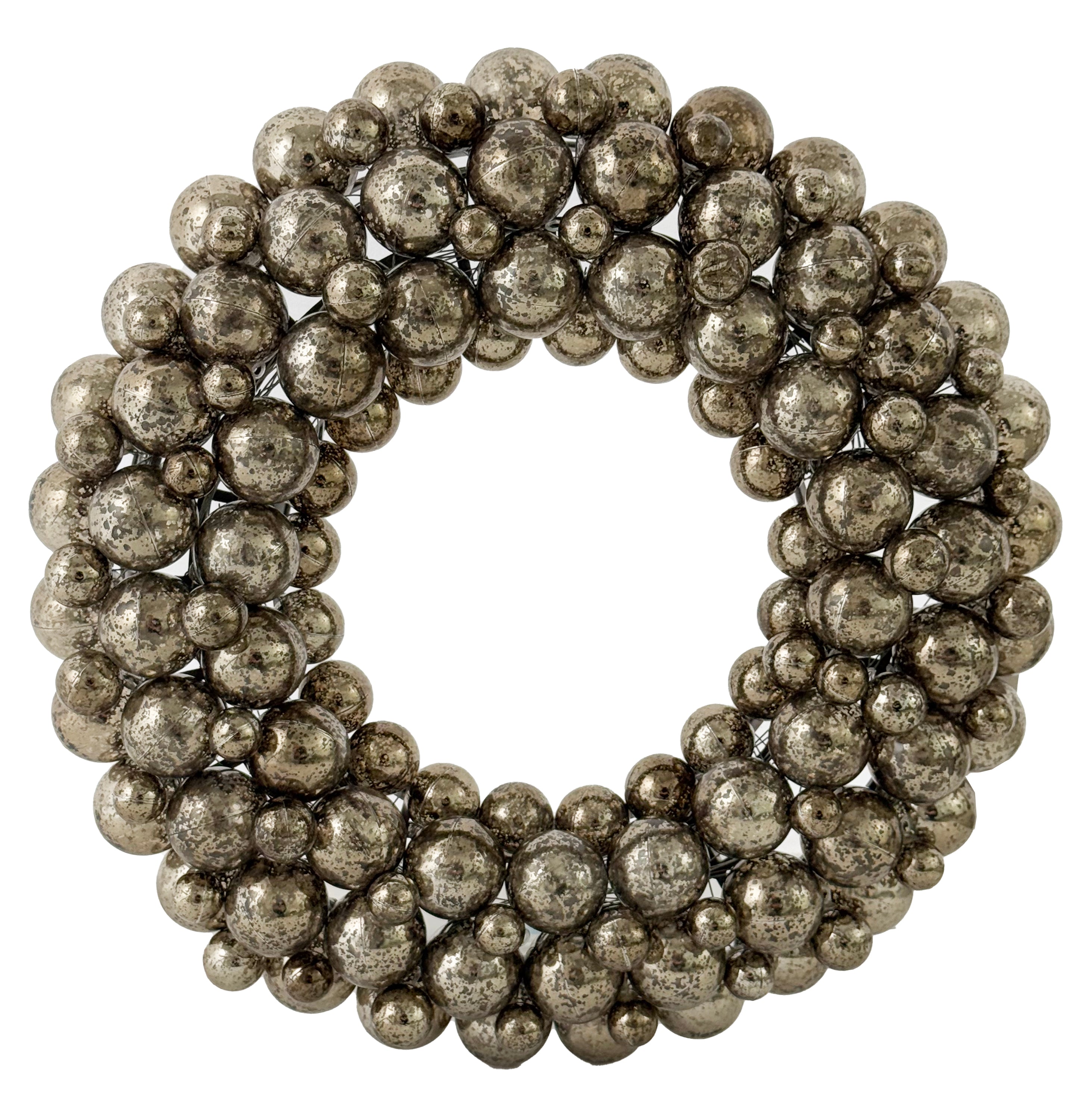 Decorative wreath made of metallic spherical beads on a white background