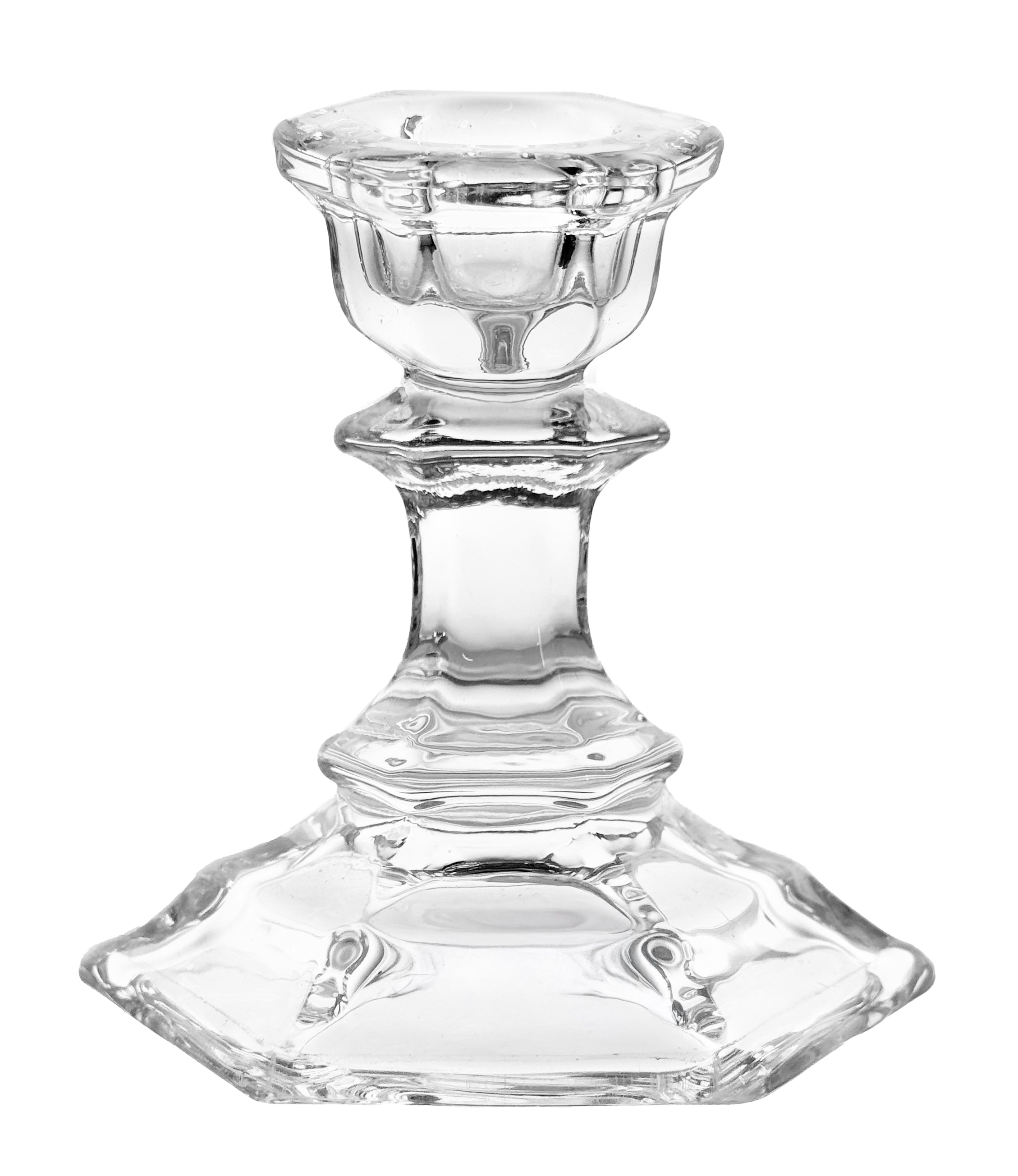 Clear glass candle holder on a white background