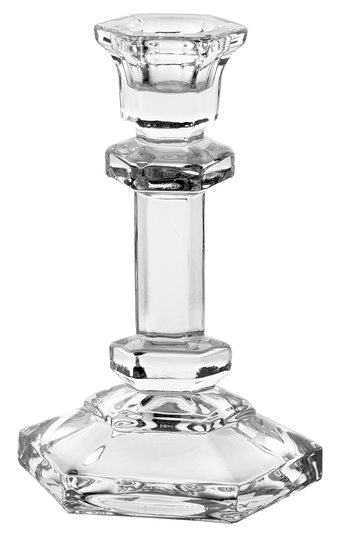 Clear glass candle holder with geometric design on a white background