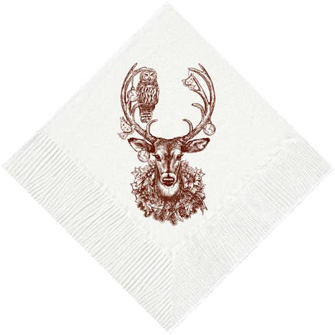 White napkin with artwork of a deer and owl design on a white background. 