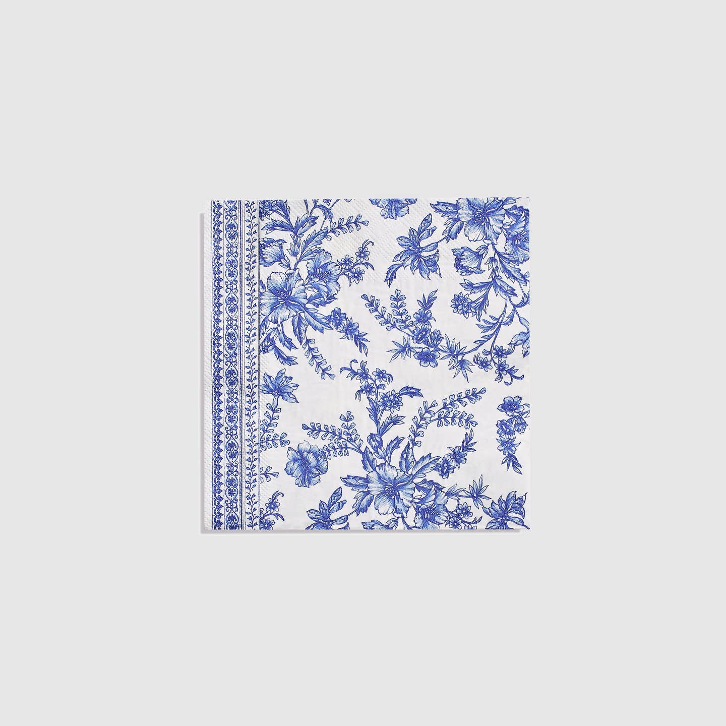 A Blue French Toile Paper Party Dinnerware set inspired by the French countryside, from Coterie Party Supplies.