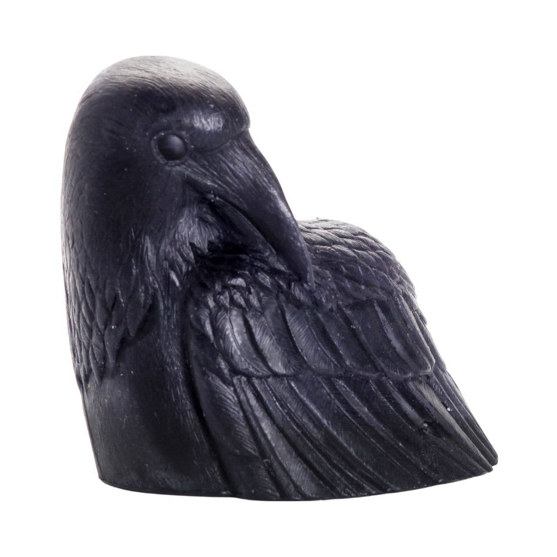 Black candle shaped like a crow head. 