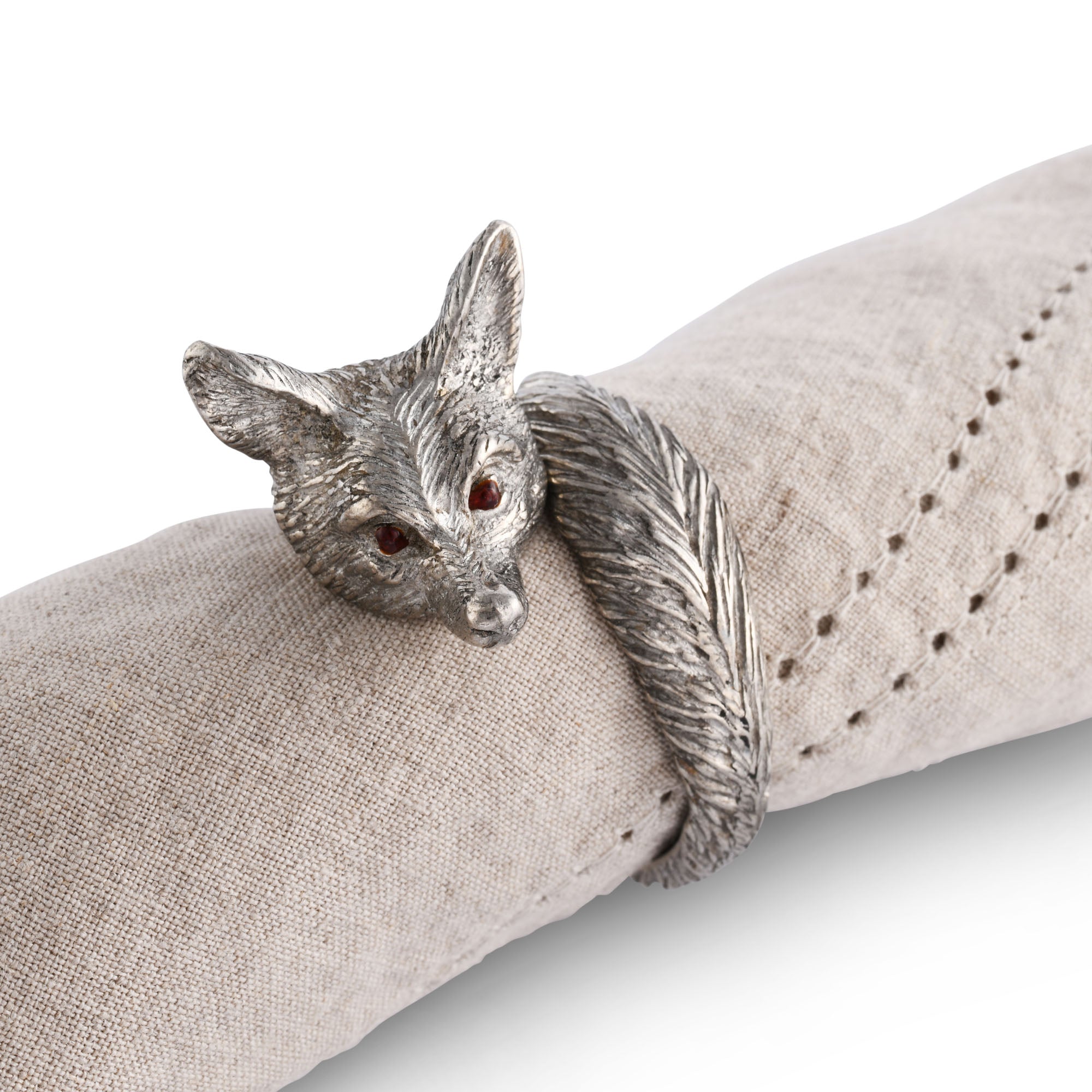 Pewter Fox Napkin Ring around a beige napkin.