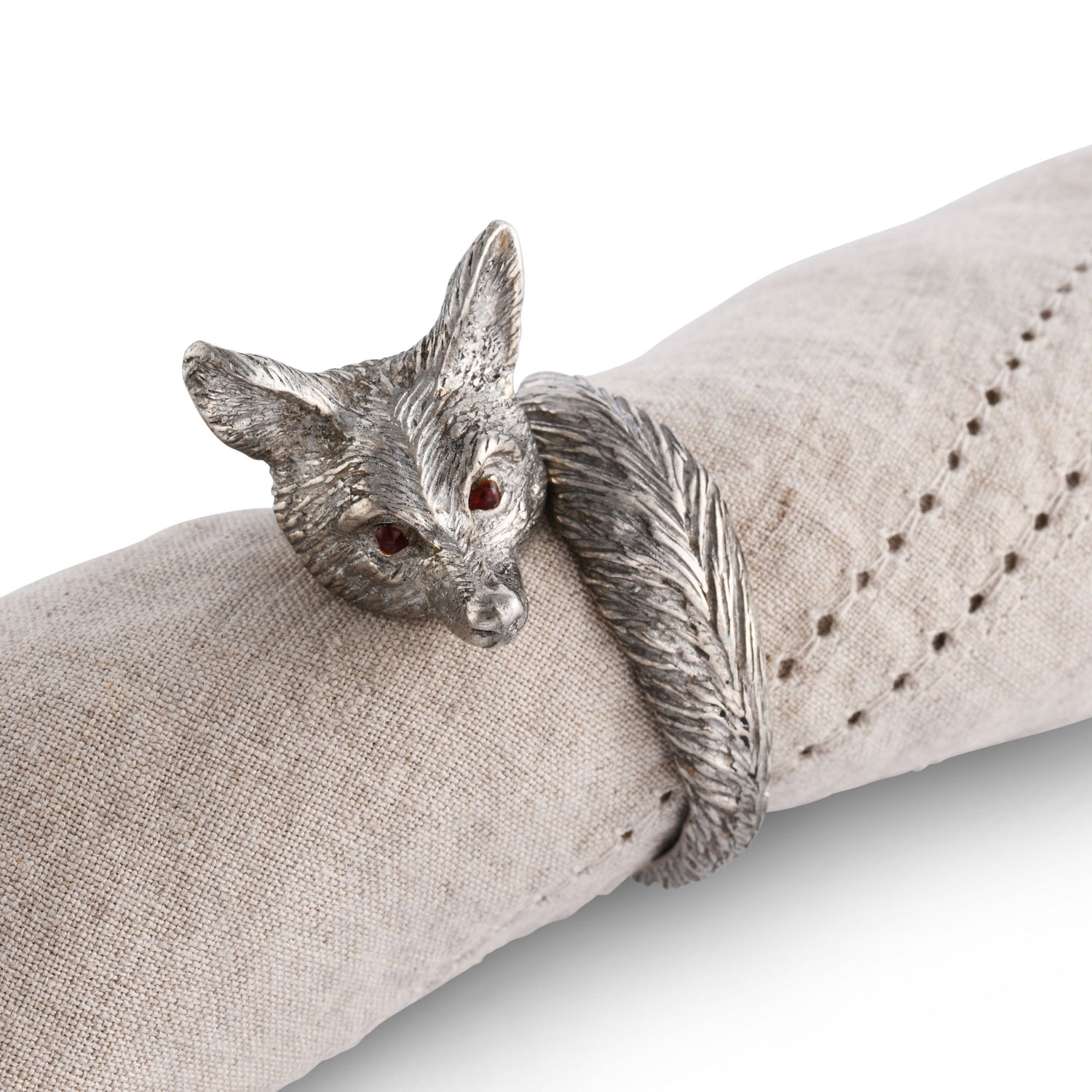 Pewter Fox Napkin Ring around a beige napkin.