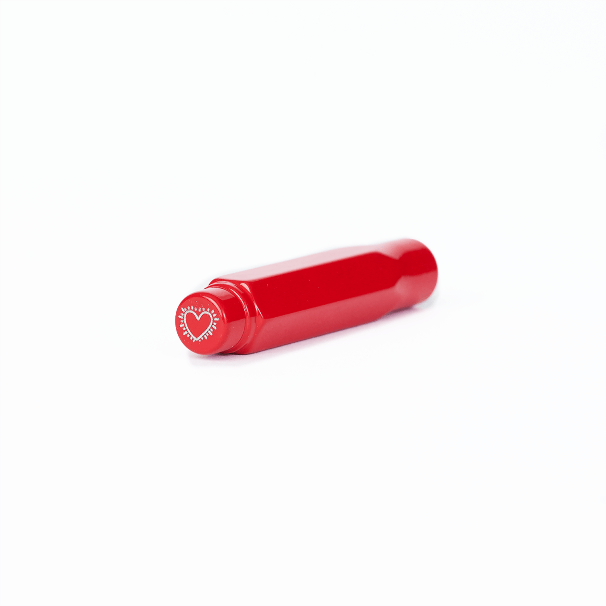 Blackwing pencil point guard with a heart design on a white background.