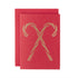 Two criss-crossed gold leaf candy canes on a red greeting card with a matching envelope.