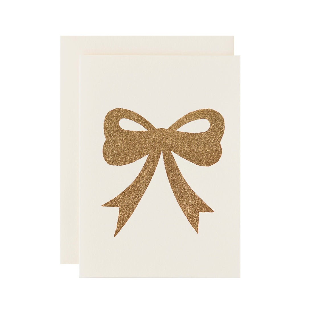 A gold foiled bow on an ivory card with a matching envelope.