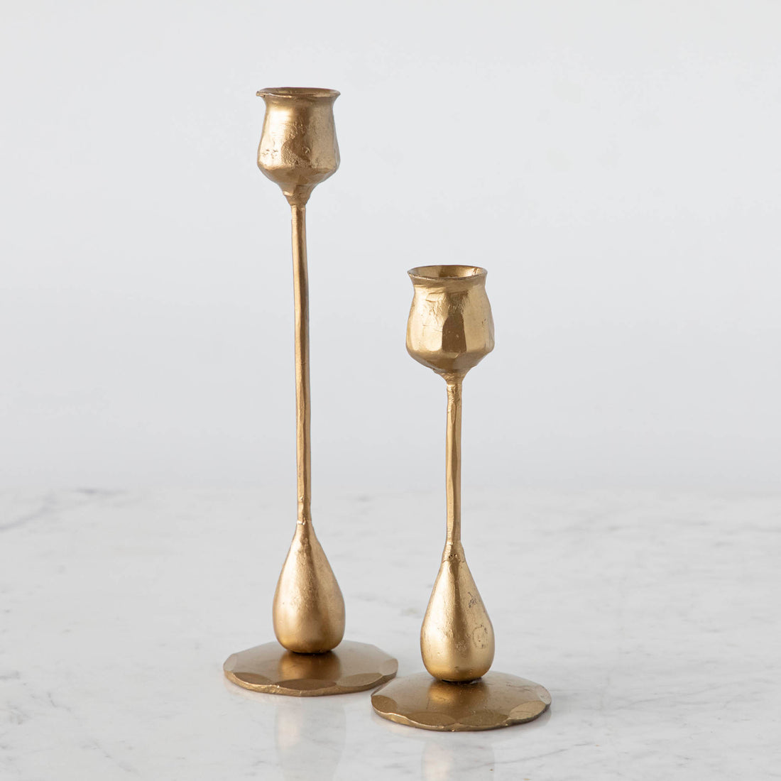 Tulip Hand-Forged Iron Taper Holders, Antique Brass Finish in two sizes.