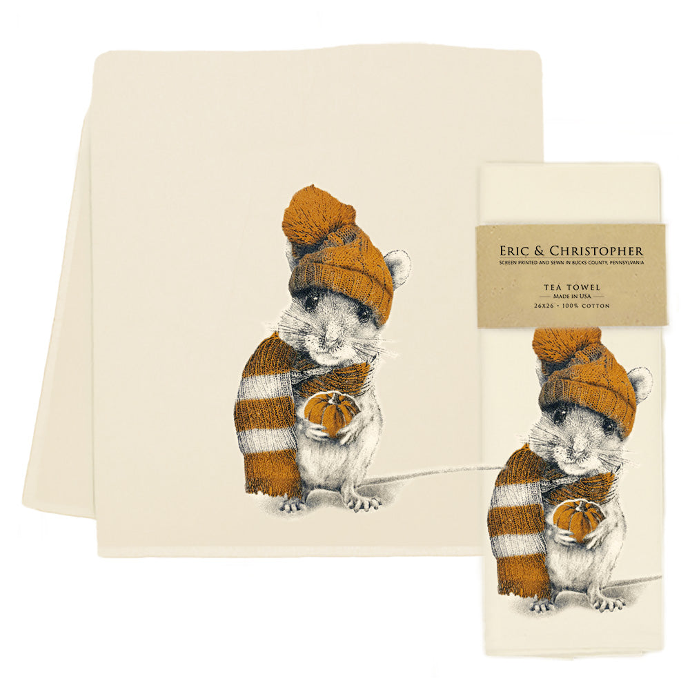 Tea towel with a design of a mouse wearing a hat and scarf and holding a pumpkin, branded &