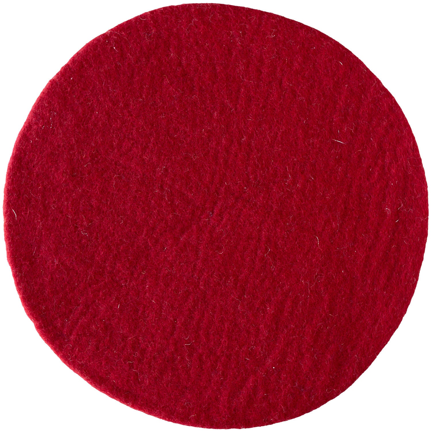 A round, flat placemat of Christmas red artisan felt is displayed against a white background.