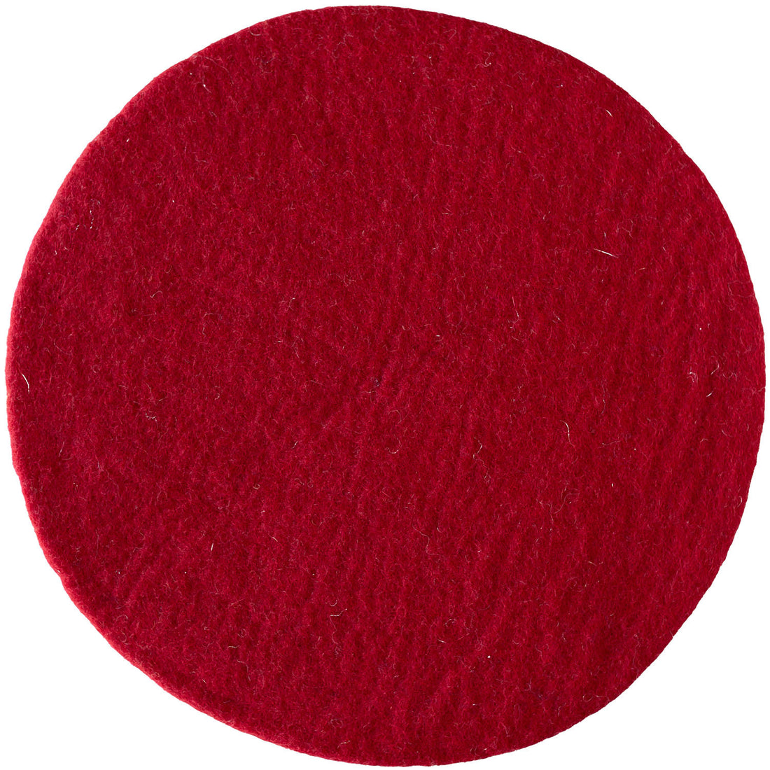 A round, flat placemat of Christmas red artisan felt is displayed against a white background.