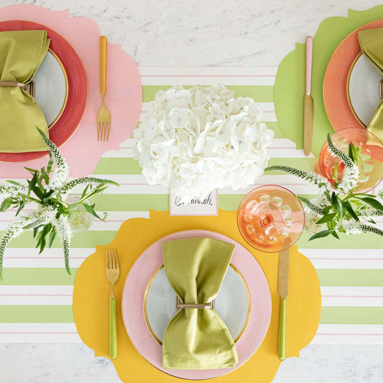 Green & Pink Awning Stripe Runner styled under a colorful table setting for three.