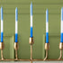 Gold menorah with blue and white menorah candles.