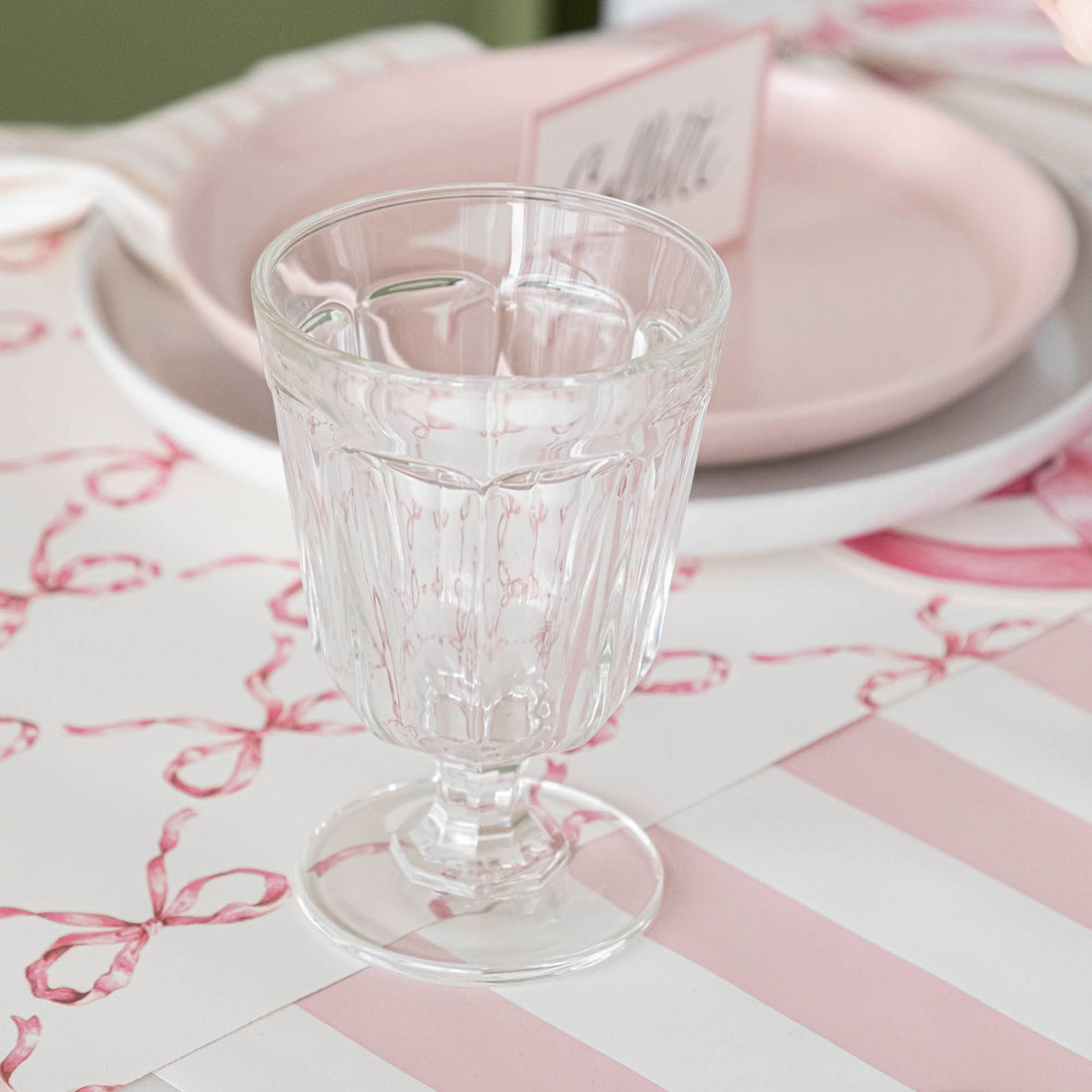 Two Casafina Living Gomos Water Glasses on a wooden table.
