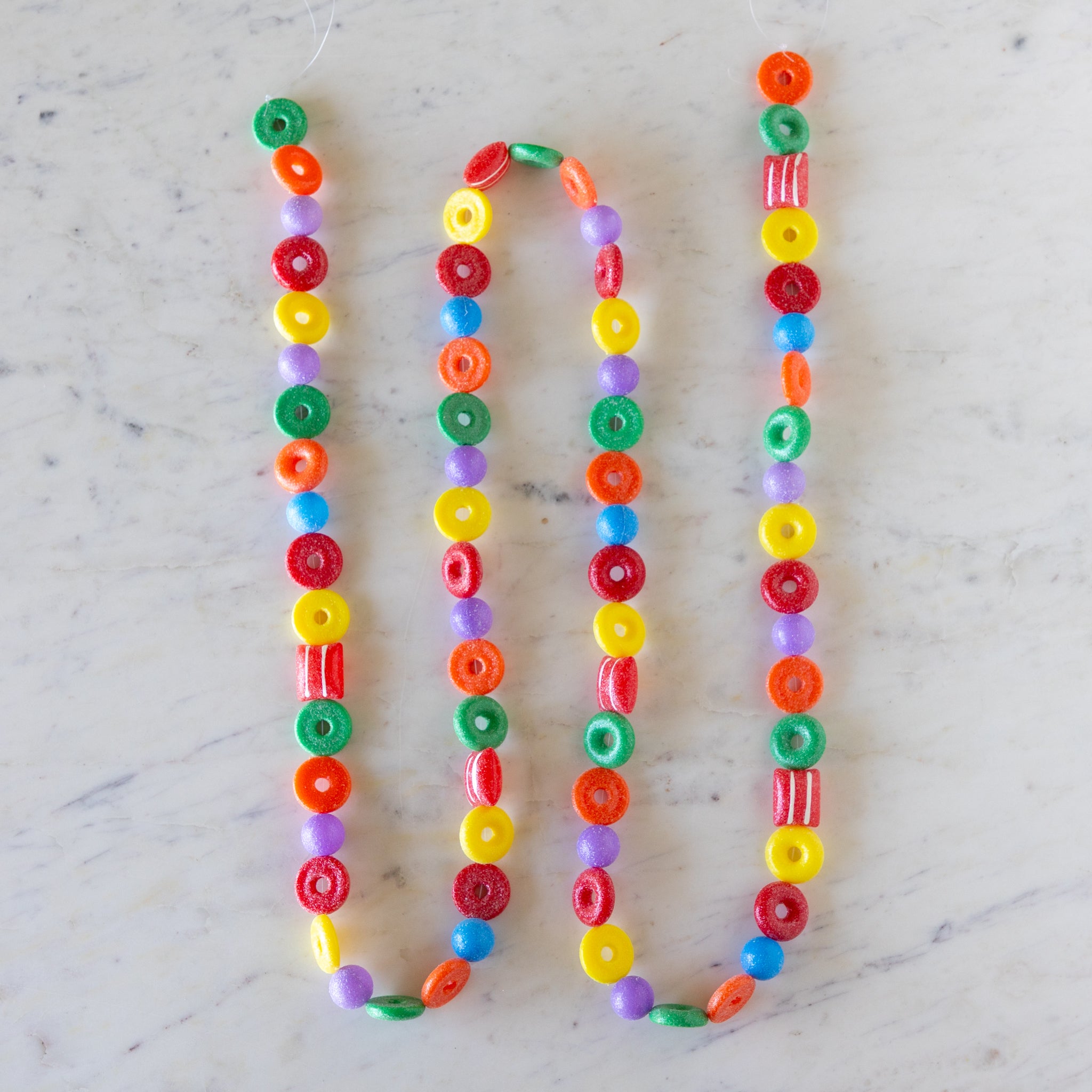 Candy Life-Saver Garland on a marble table.