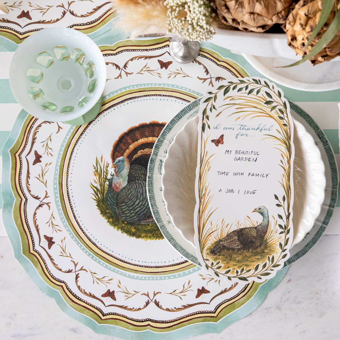 Die-cut Heritage Turkey China Placemat with coordinating table card and fall themed decor.