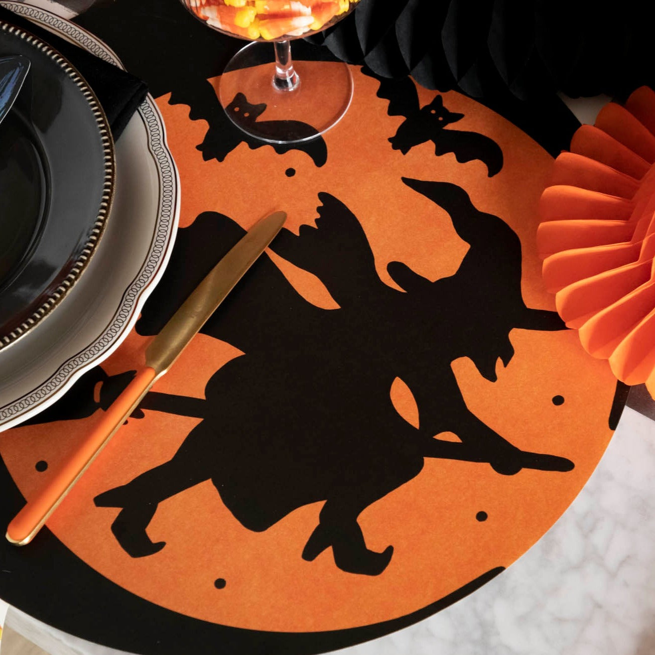 Die-cut Wicked Witch Placemat table setting.