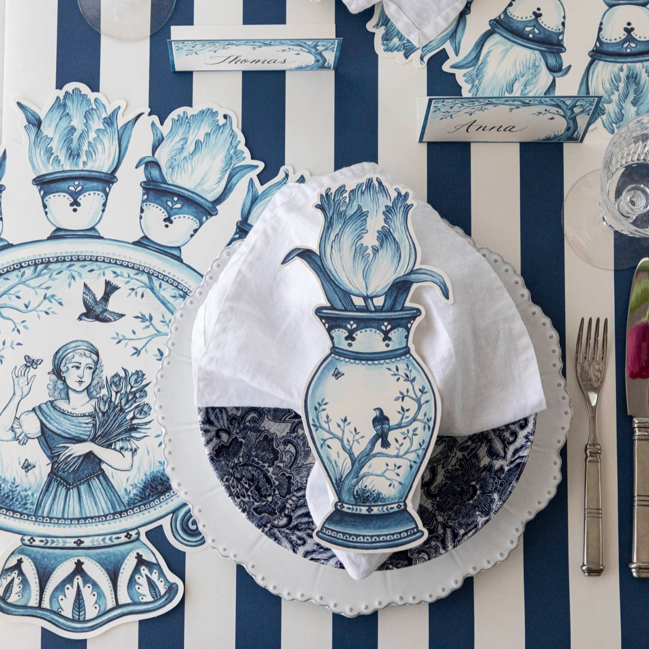Versatile pieces of table decor including Indigo Tulip Table Accents from Hester & Cook accentuates the table setting.