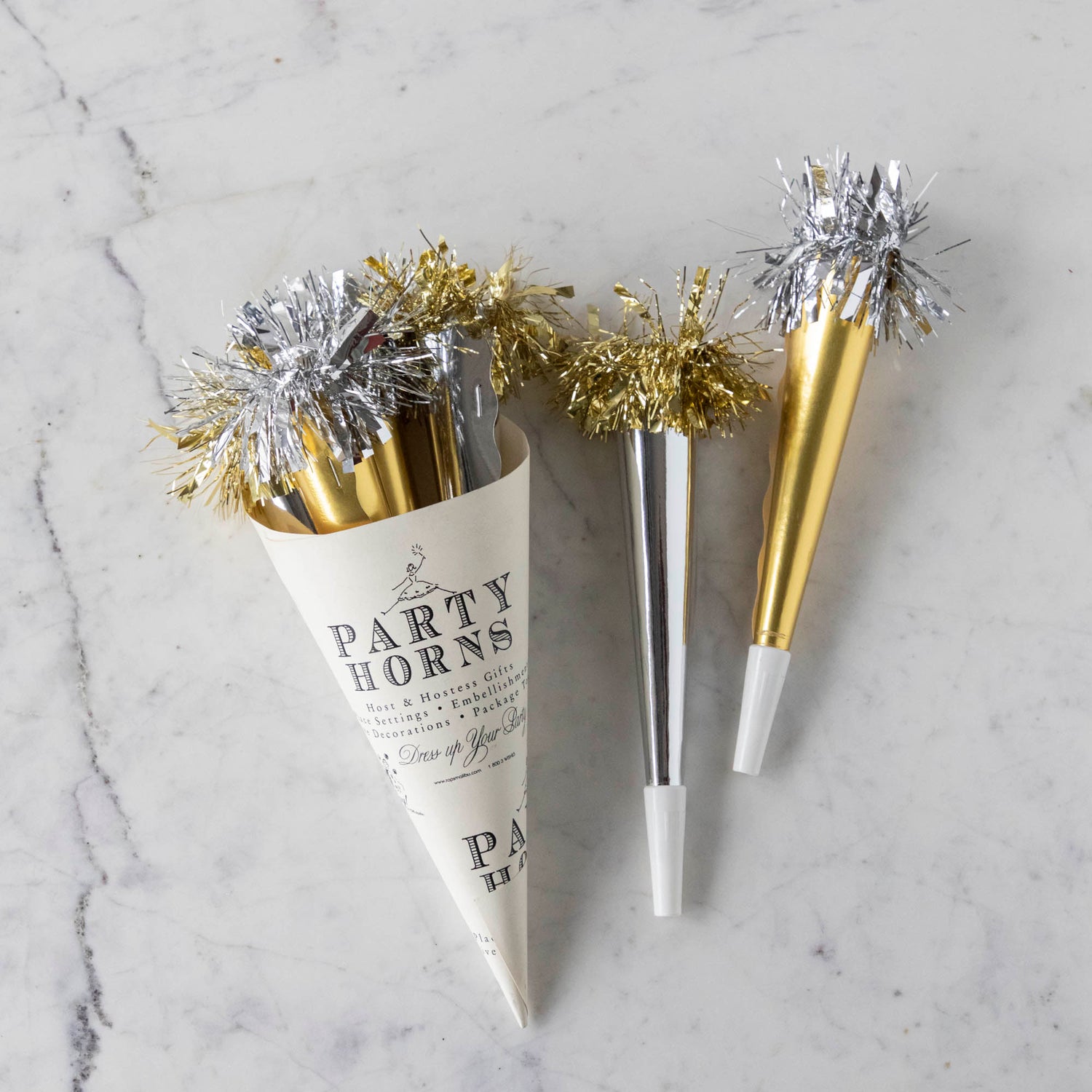 An elegant Tops Malibu Party Horn Bouquet Gold/Silver with tinsel tassels.
