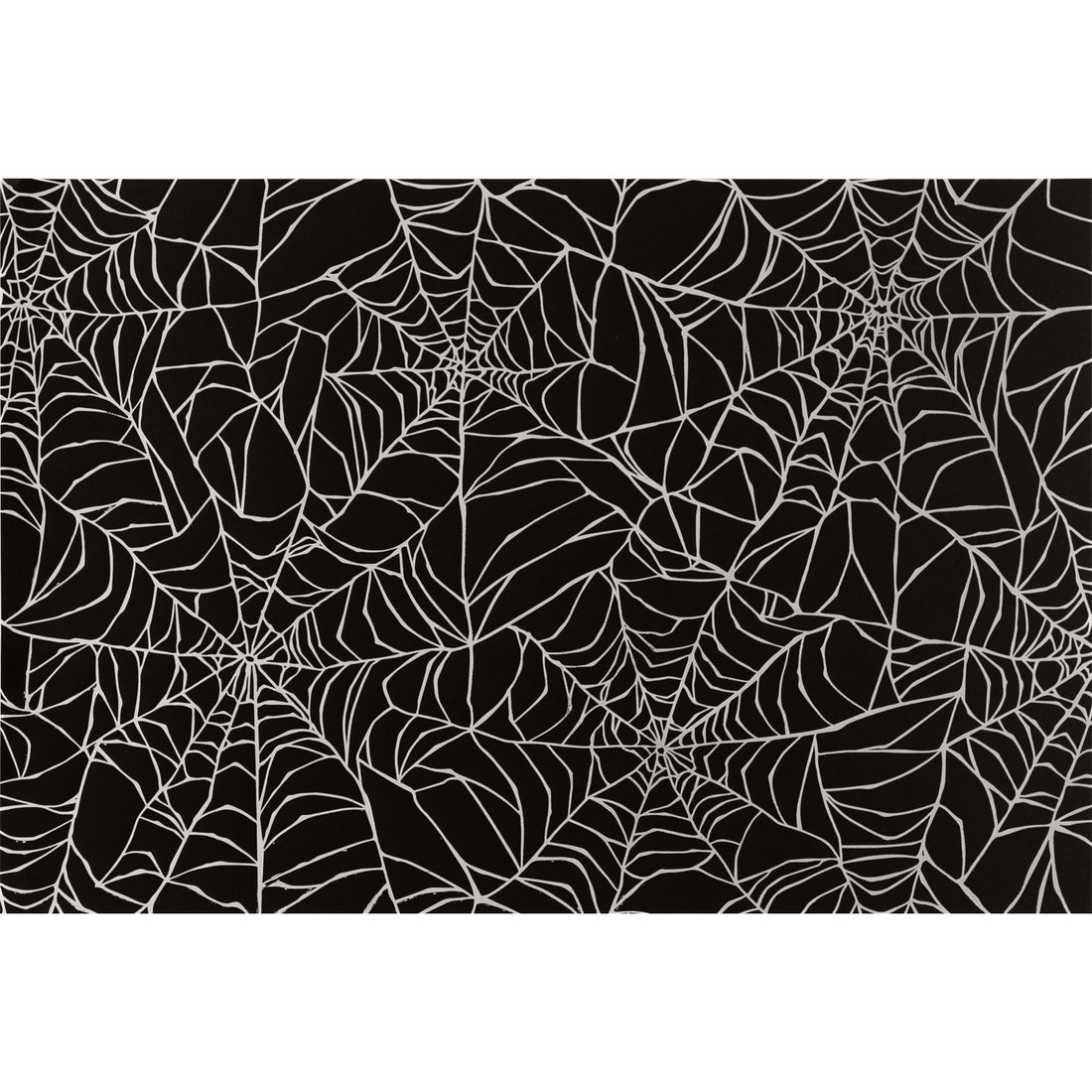 Spiderweb Placemat by Hester &amp; Cook featuring an overlapping spiderweb pattern in silver with a black background.