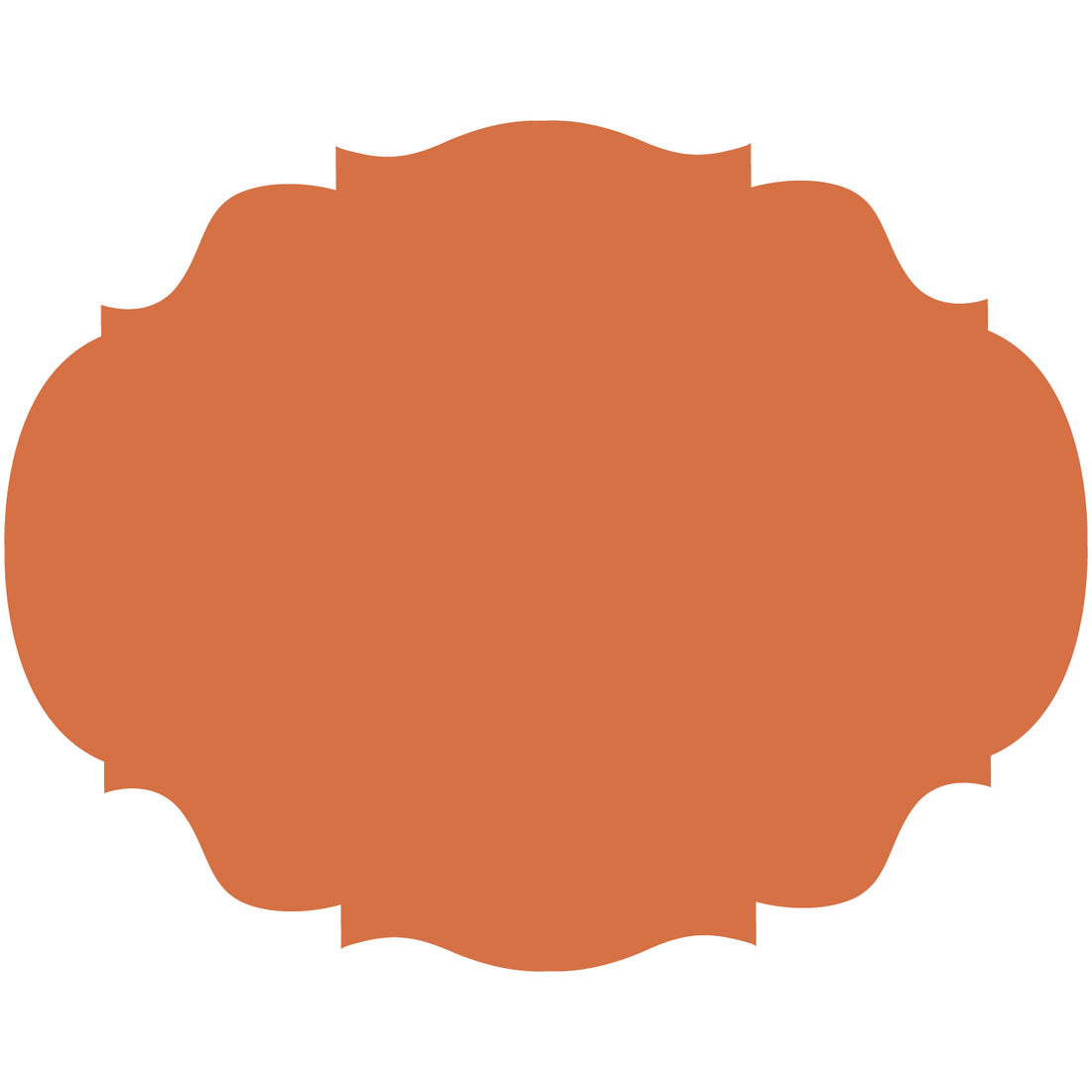 An orange scalloped-edge paper placemat with an intricate, symmetrical shape.