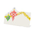 A white, rectangular freestanding place card featuring whimsical artwork of vintage-style Christmas ornaments and gold tinsel adorning the top and right edges of the card.