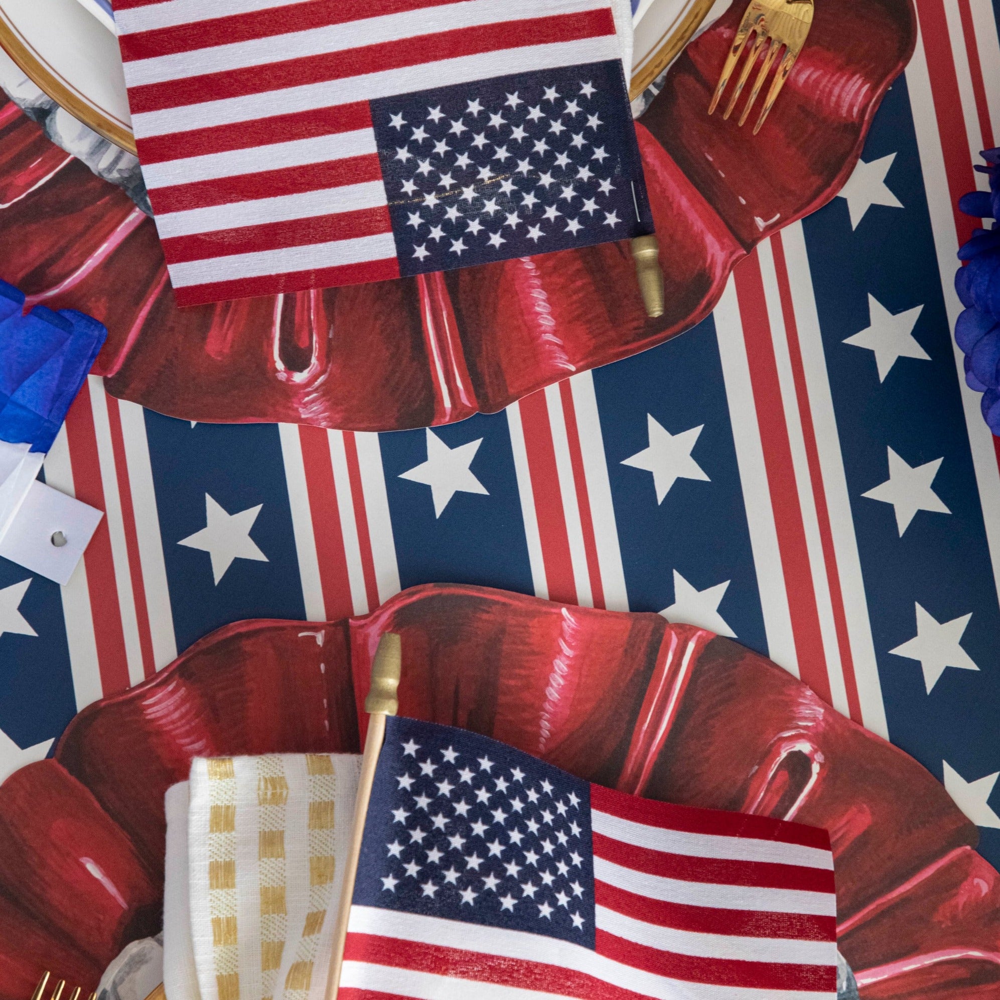 Close-up of the Stars and Stripes Runner under a patriotic table setting, from above.
