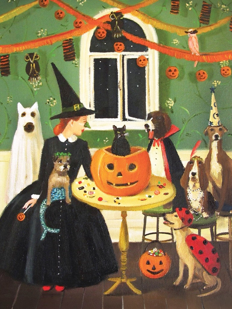 A 500 piece jigsaw puzzle depicting a whimsical Halloween scene with dogs in costumes, a black cat, and a jack-o-lantern.