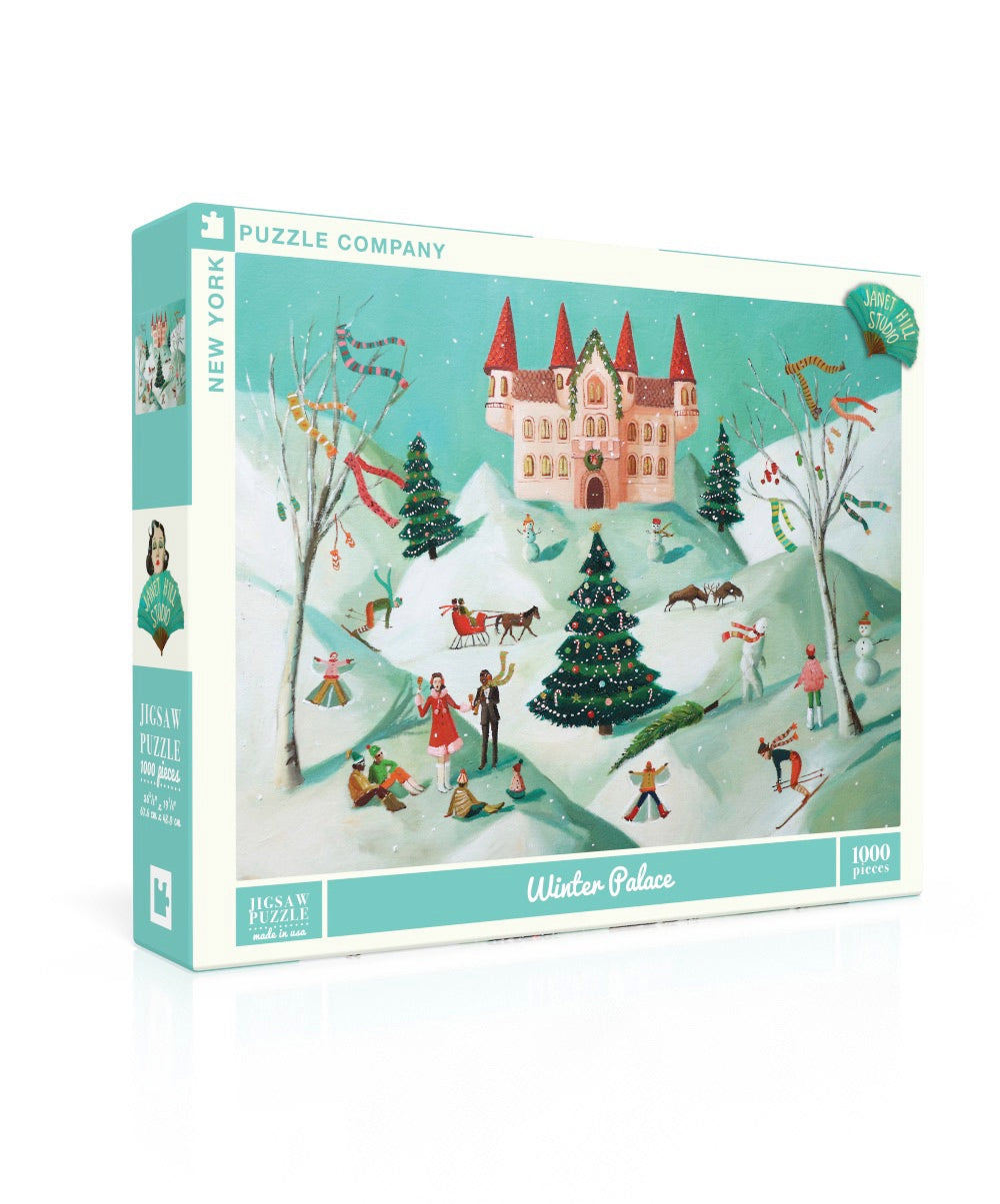 Puzzle box depicting a snowy winter scene with a castle in the background and people frolicking in the snow in the foreground.  Artwork by Janet Hill.