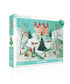 Puzzle box depicting a snowy winter scene with a castle in the background and people frolicking in the snow in the foreground.  Artwork by Janet Hill. 
