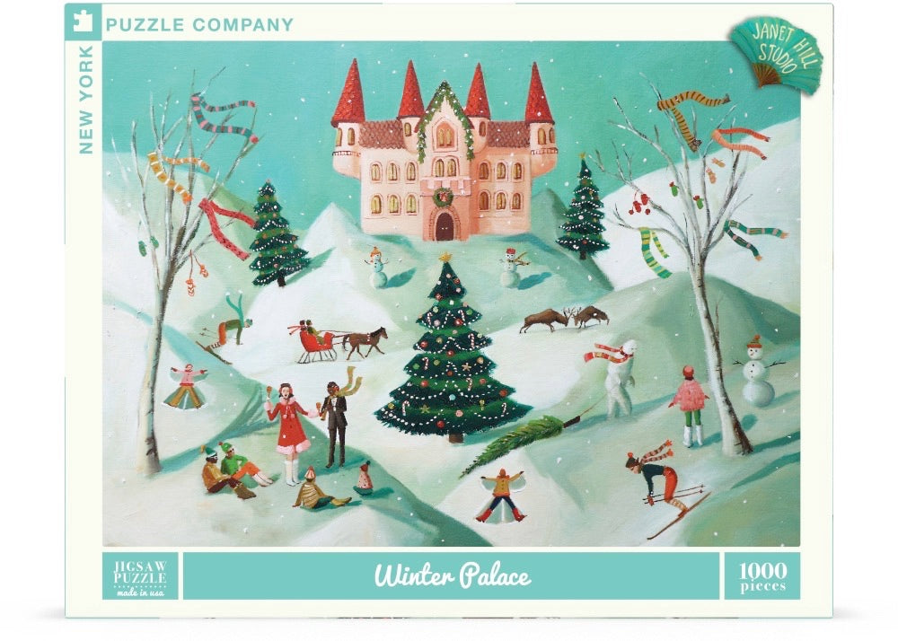 Puzzle box depicting a snowy winter scene with a castle in the background and people frolicking in the snow in the foreground. Artwork by Janet Hill.