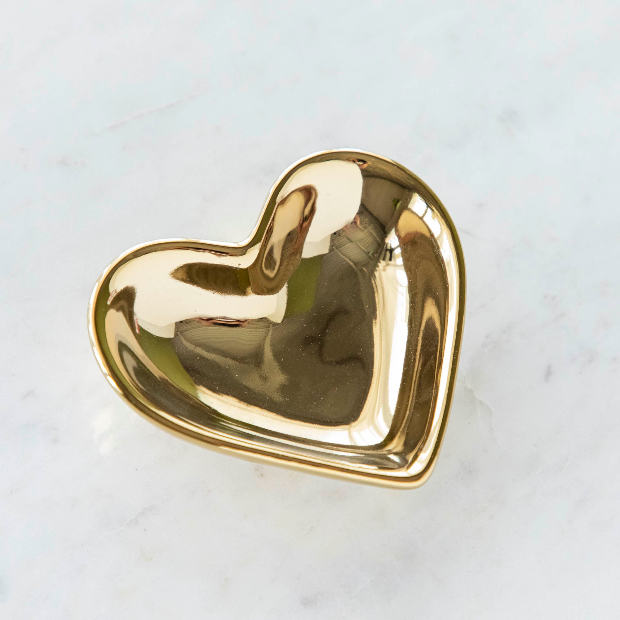 Gold Heart Shaped Pinch Bowl.